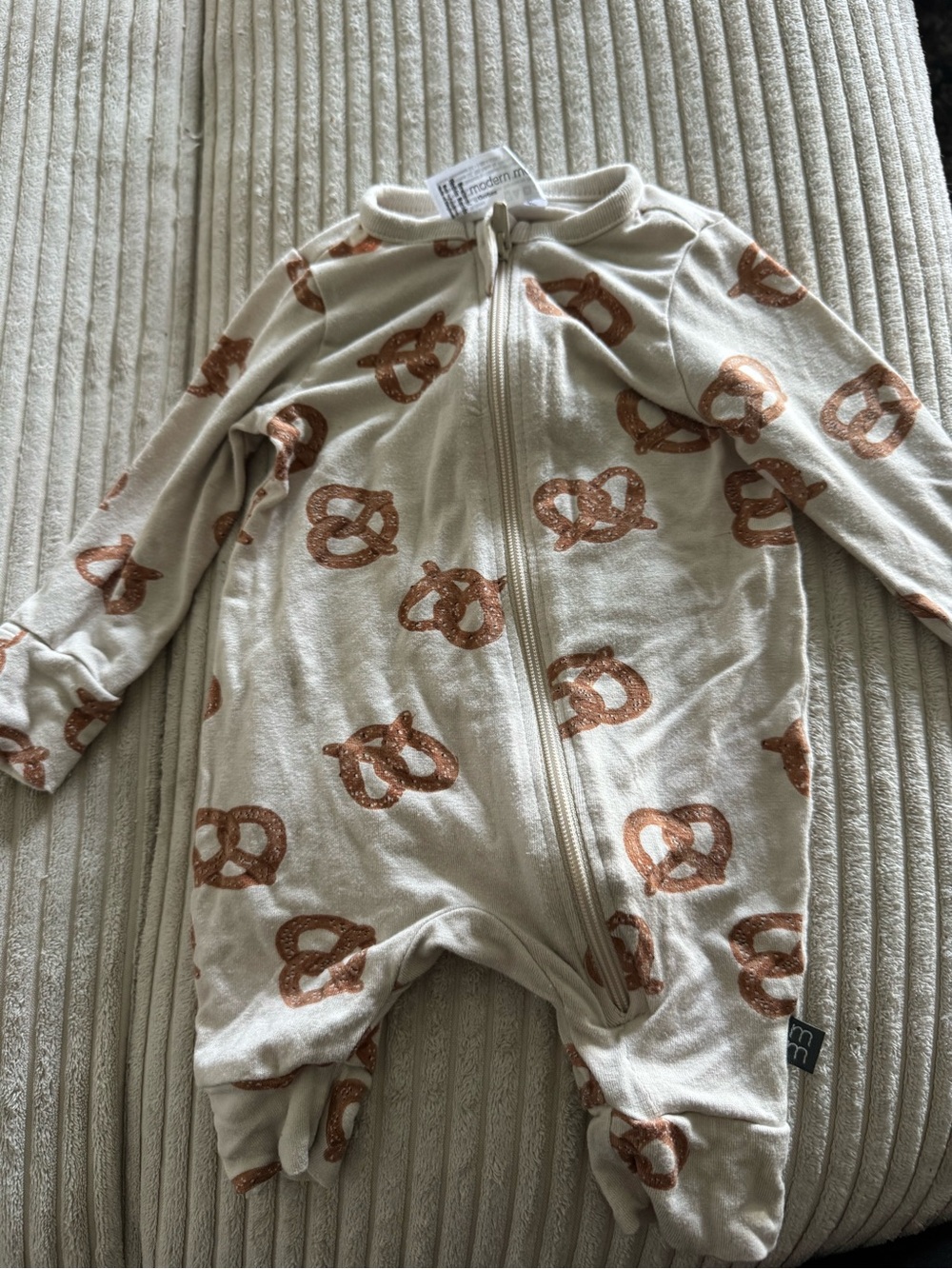 Cream Footed Baby One-Piece with Copper Pretzel Print